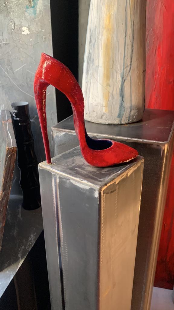 Red and black woman shoe