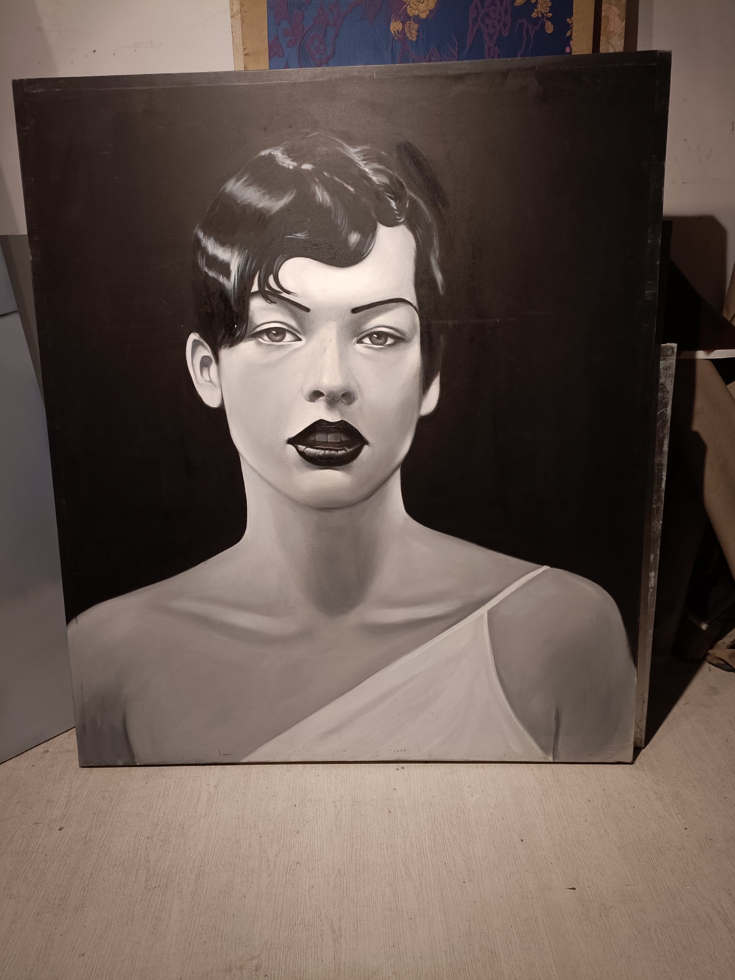 Milla Jovovich painting